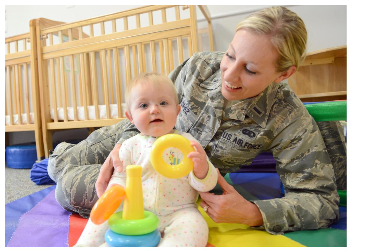mom doing tummy time with infant