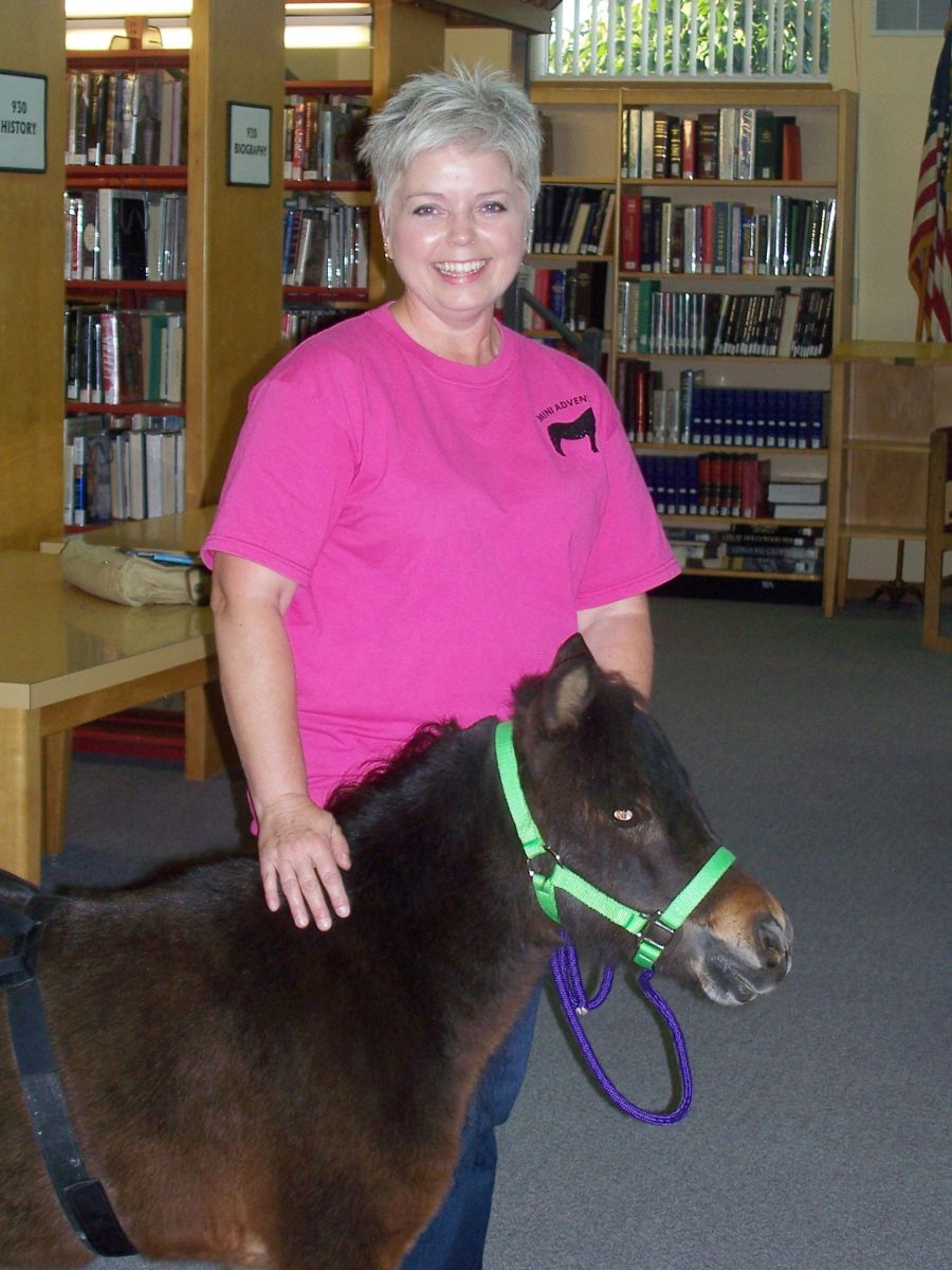 picture of miniature horse and owner